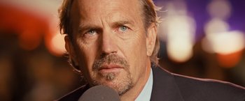 Movie still from “Swing Vote” (2008), directed by Joshua Michael Stern – A person with a microphone; Close Up shot, Low angle