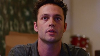 Movie still from “Swingers” (1996), directed by Doug Liman – A man's face looking upward; Close Up shot, Low angle