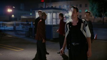 Movie still from “Swingers” (1996), directed by Doug Liman – A group of men walking down a street at night; Medium shot, Over the shoulder angle