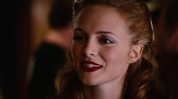 Movie still from “Swingers” (1996), directed by Doug Liman – A person with red lipstick on her lips; Close Up shot, Over the shoulder angle