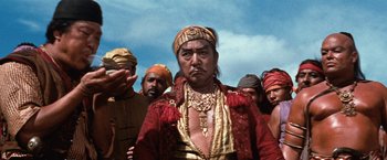 Movie still from “Swiss Family Robinson” (1960), directed by Ken Annakin – A group of men standing next to each other; Medium shot, Low angle