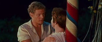Movie still from “Swiss Family Robinson” (1960), directed by Ken Annakin – A man and a woman talking to each other; Close Up shot, Over the shoulder angle