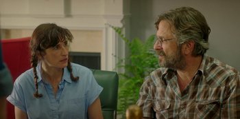 Movie still from “Sword of Trust” (2019), directed by Lynn Shelton – A man and a woman sitting in front of each other; Medium shot, Over the shoulder angle