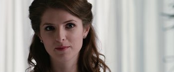 Movie still from “Table 19” (2017), directed by Jeffrey Blitz – A woman's face in front of a white curtain; Close Up shot, Over the shoulder angle