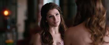 Movie still from “Table 19” (2017), directed by Jeffrey Blitz – A person with long hair; Close Up shot, Over the shoulder angle