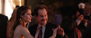 Movie still from “Table 19” (2017), directed by Jeffrey Blitz – A man and a woman are dancing together; Close Up shot, Over the shoulder angle