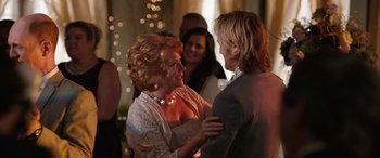 Movie still from “Table 19” (2017), directed by Jeffrey Blitz – A woman and a young man dancing at a party; Close Up shot, Over the shoulder angle