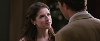 Movie still from “Table 19” (2017), directed by Jeffrey Blitz – A person talking to another person; Close Up shot, Over the shoulder angle