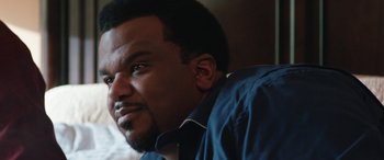 Movie still from “Table 19” (2017), directed by Jeffrey Blitz – A person with a beard; Close Up shot, Over the shoulder angle