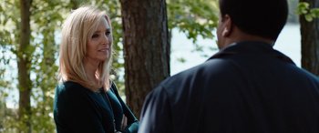 Movie still from “Table 19” (2017), directed by Jeffrey Blitz – A woman is talking to a man in a park; Close Up shot, Over the shoulder angle