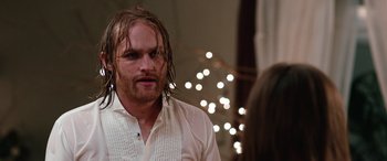 Movie still from “Table 19” (2017), directed by Jeffrey Blitz – A person wearing a white shirt; Close Up shot, Over the shoulder angle