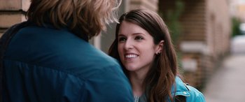 Movie still from “Table 19” (2017), directed by Jeffrey Blitz – A person smiling at a person; Close Up shot, Over the shoulder angle