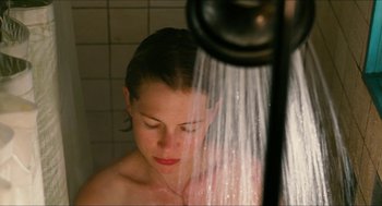 Movie still from “Take This Waltz” (2011), directed by Sarah Polley – A woman is taking a shower in a bathroom; Close Up shot, Overhead angle