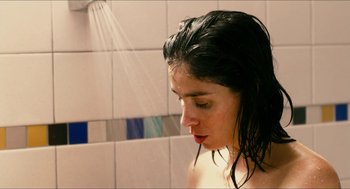 Movie still from “Take This Waltz” (2011), directed by Sarah Polley – A woman is taking a shower in a bathroom; Close Up shot, High angle