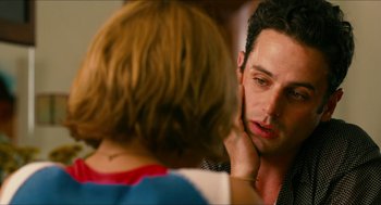 Movie still from “Take This Waltz” (2011), directed by Sarah Polley – A man and a woman looking at one another; Close Up shot, Over the shoulder angle