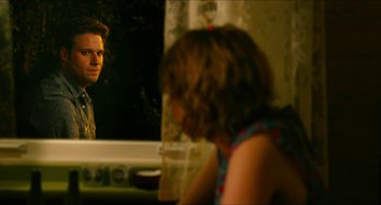 Movie still from “Take This Waltz” (2011), directed by Sarah Polley – A man and a woman looking at each other in a mirror; Medium shot, Over the shoulder angle