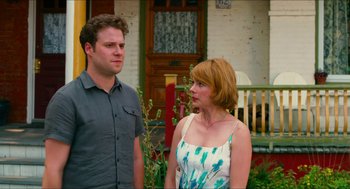 Movie still from “Take This Waltz” (2011), directed by Sarah Polley – A man and a woman standing next to each other; Medium shot, Over the shoulder angle