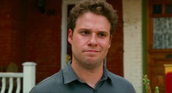 Movie still from “Take This Waltz” (2011), directed by Sarah Polley – A person wearing a gray shirt; Close Up shot, Over the shoulder angle
