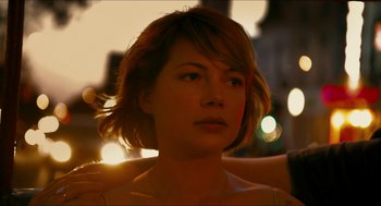 Movie still from “Take This Waltz” (2011), directed by Sarah Polley – A person with short hair; Close Up shot, Over the shoulder angle