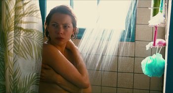 Movie still from “Take This Waltz” (2011), directed by Sarah Polley – A woman is taking a shower in a bathroom; Close Up shot, High angle
