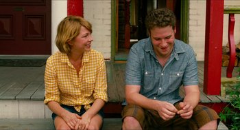 Movie still from “Take This Waltz” (2011), directed by Sarah Polley – A man and a woman sitting next to each other; Medium shot, Over the shoulder angle