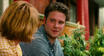 Movie still from “Take This Waltz” (2011), directed by Sarah Polley – A man and a woman are talking outside; Close Up shot, Over the shoulder angle
