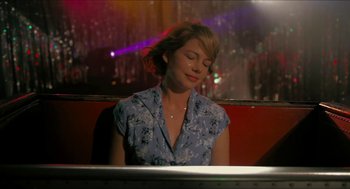 Movie still from “Take This Waltz” (2011), directed by Sarah Polley – A woman sitting in front of a computer keyboard; Close Up shot, Over the shoulder angle