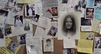 Movie still from “Taking Off” (1971), directed by Milos Forman – A bunch of pictures and notes on a wall; Close Up shot, High angle