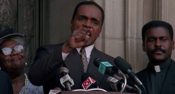 Movie still from “Tales from the Hood” (1995), directed by Rusty Cundieff – Close Up shot, Low angle