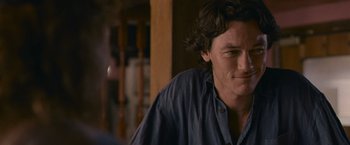 Movie still from “Tamara Drewe” (2010), directed by Stephen Frears – A person with long hair; Close Up shot, Over the shoulder angle