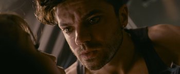 Movie still from “Tamara Drewe” (2010), directed by Stephen Frears – A man's face looking at the camera; Close Up shot, Overhead angle