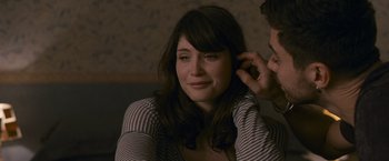 Movie still from “Tamara Drewe” (2010), directed by Stephen Frears – A woman sitting in front of a mans ear; Close Up shot, Over the shoulder angle