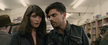 Movie still from “Tamara Drewe” (2010), directed by Stephen Frears – A man and a woman standing next to each other; Close Up shot, Over the shoulder angle