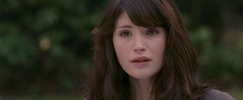 Movie still from “Tamara Drewe” (2010), directed by Stephen Frears – A person with long hair; Close Up shot, Over the shoulder angle