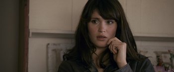 Movie still from “Tamara Drewe” (2010), directed by Stephen Frears – A person sitting in front of a window; Close Up shot, Over the shoulder angle