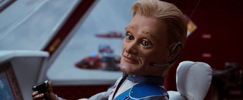 Movie still from “Team America: World Police” (2004), directed by Trey Parker – The head of a doll; Close Up shot, Low angle