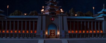 Movie still from “Team America: World Police” (2004), directed by Trey Parker – A building that has lights on top of it; Extreme Wide shot, High angle