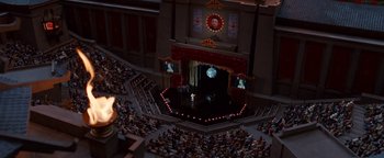 Movie still from “Team America: World Police” (2004), directed by Trey Parker – An overhead view of an audience in a theater; Extreme Wide shot, High angle