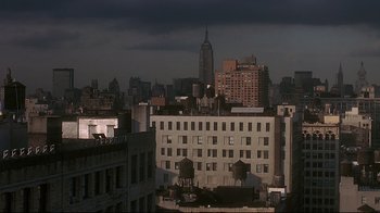 Movie still from “Teenage Mutant Ninja Turtles” (1990), directed by Steve Barron – A view of a city skyline from a high rise building; Extreme Wide shot, High angle