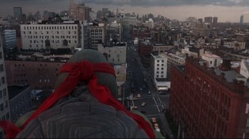 Movie still from “Teenage Mutant Ninja Turtles” (1990), directed by Steve Barron – A view of a city from the top of a building; Extreme Close Up shot, High angle