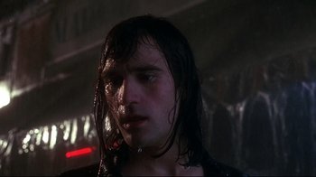 Movie still from “Teenage Mutant Ninja Turtles” (1990), directed by Steve Barron – A person with wet hair; Close Up shot, Low angle