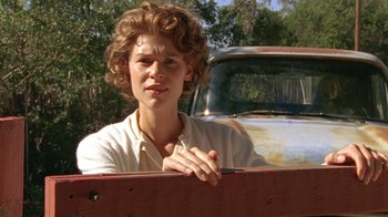 Movie still from “Temple Grandin” (2010), directed by Mick Jackson – A woman leaning on the back of a truck; Close Up shot, Low angle