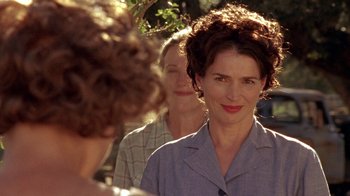 Movie still from “Temple Grandin” (2010), directed by Mick Jackson – A woman standing next to another woman in a field; Close Up shot, Over the shoulder angle