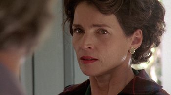 Movie still from “Temple Grandin” (2010), directed by Mick Jackson – A person wearing a jacket; Close Up shot, Over the shoulder angle