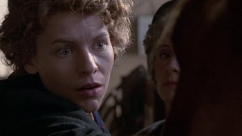 Movie still from “Temple Grandin” (2010), directed by Mick Jackson – A young man and a young woman looking at the camera; Close Up shot, Over the shoulder angle