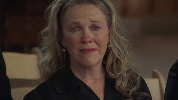 Movie still from “Temple Grandin” (2010), directed by Mick Jackson – A person wearing a black shirt; Close Up shot, Over the shoulder angle