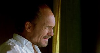 Movie still from “Tender Mercies” (1983), directed by Bruce Beresford – A person with a beard; Close Up shot, Low angle