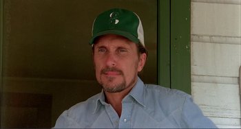 Movie still from “Tender Mercies” (1983), directed by Bruce Beresford – A person wearing a hat; Close Up shot, Low angle