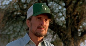 Movie still from “Tender Mercies” (1983), directed by Bruce Beresford – A person wearing a hat; Close Up shot, Low angle