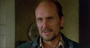 Movie still from “Tender Mercies” (1983), directed by Bruce Beresford – A person wearing a jacket; Close Up shot, Low angle